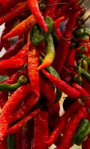 Imagen del pimiento de Candeleda, en la provincia española de Ávila, usada para ilustrar la expresión venirle como anillo al dedo.