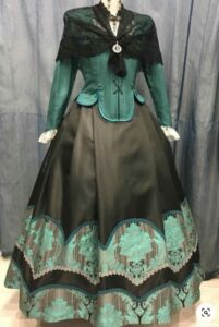 Traje de baturra verde y negro en una imagen usada para ilustrar la expresión curarse en salud.